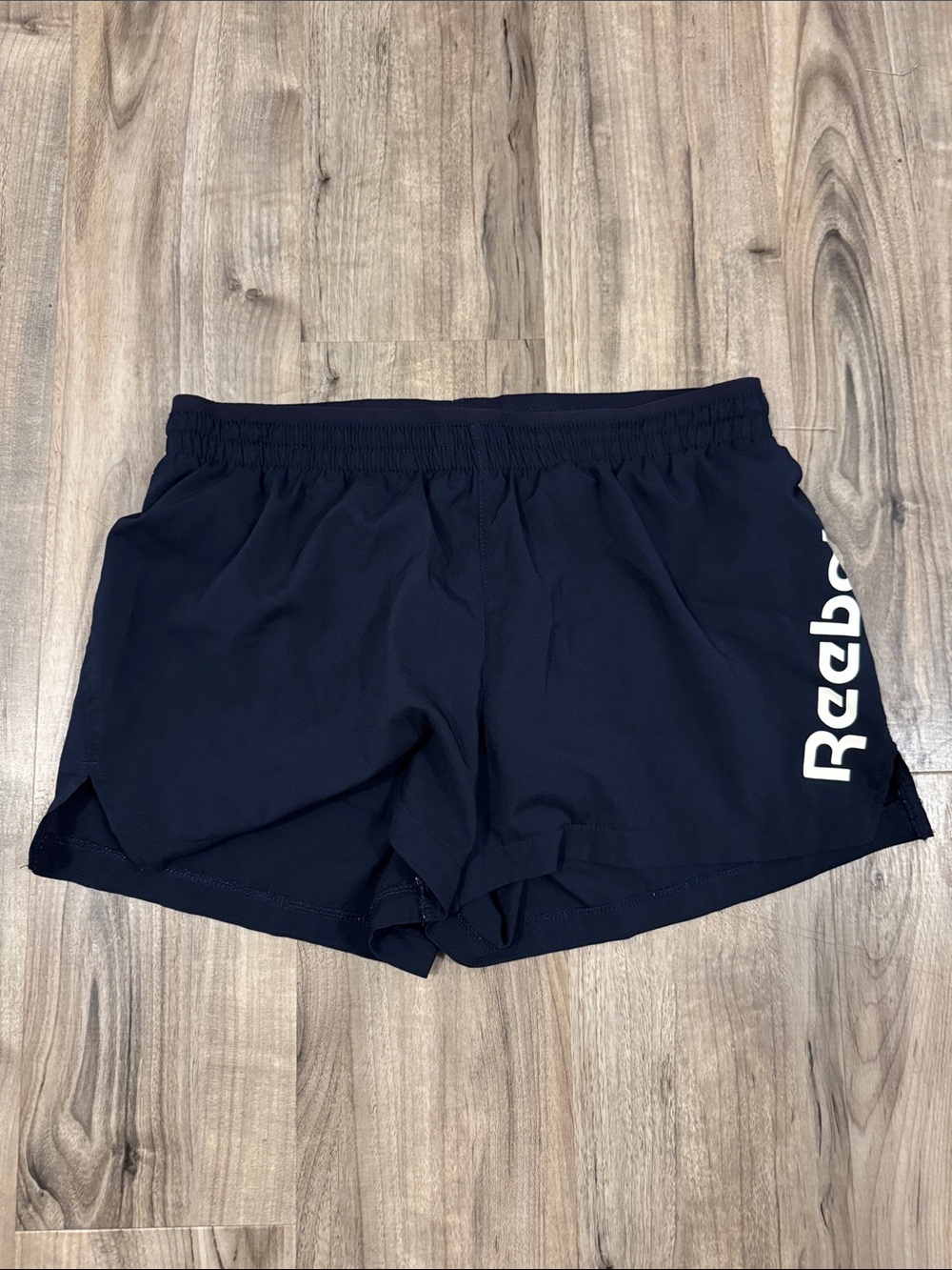 Reebok Black Athletic Shorts with White Logo Print